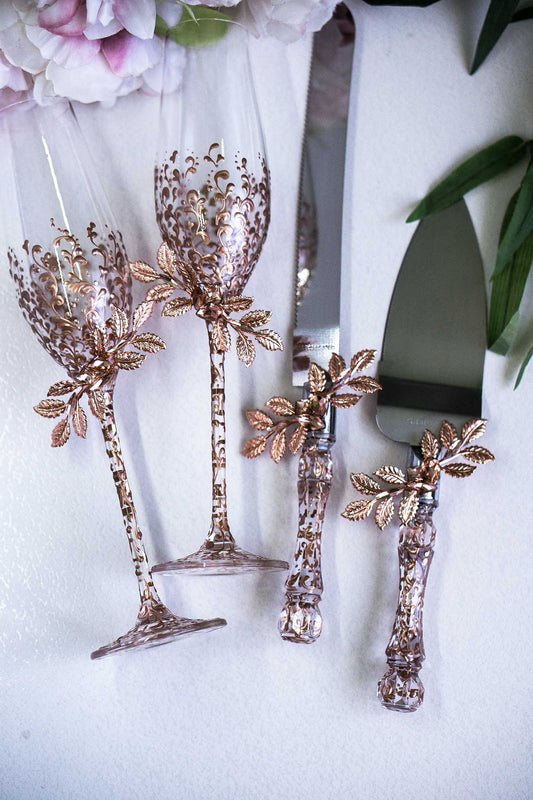 Rose gold champagne flutes and cake server set