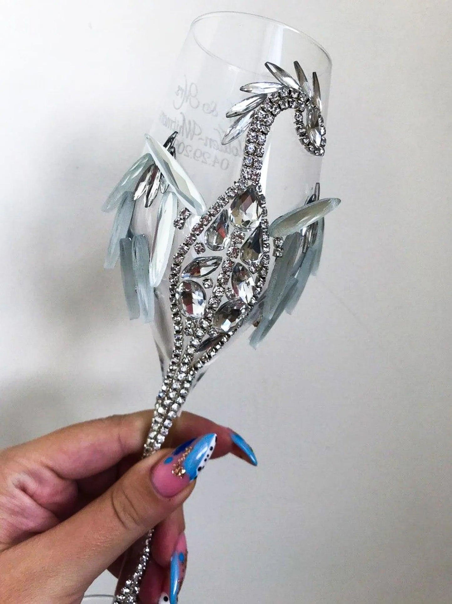 Elegant Champagne Glass with Silver Dragon Accent