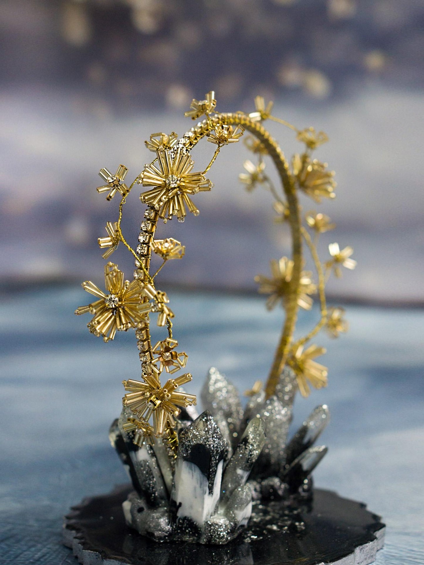 Delicate gold headband with dandelion flowers and crystal accents
