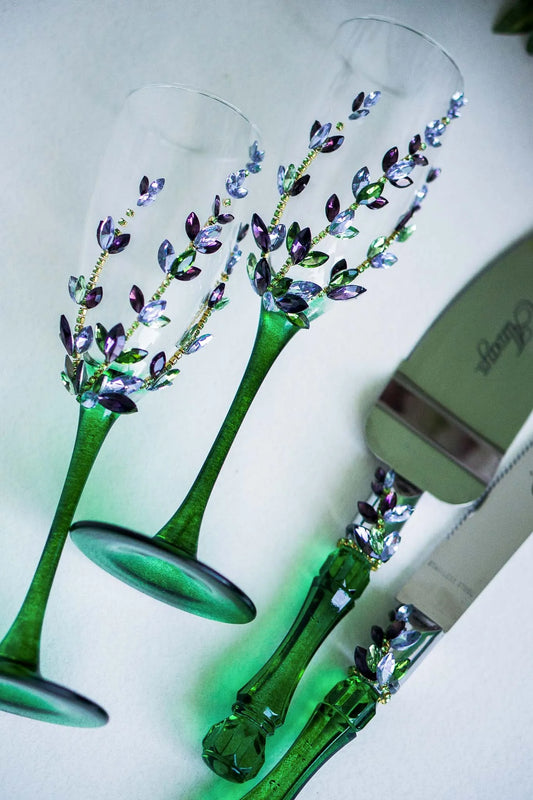 Stylish wedding glassware and cake cutting set with crystal and wildflower accents