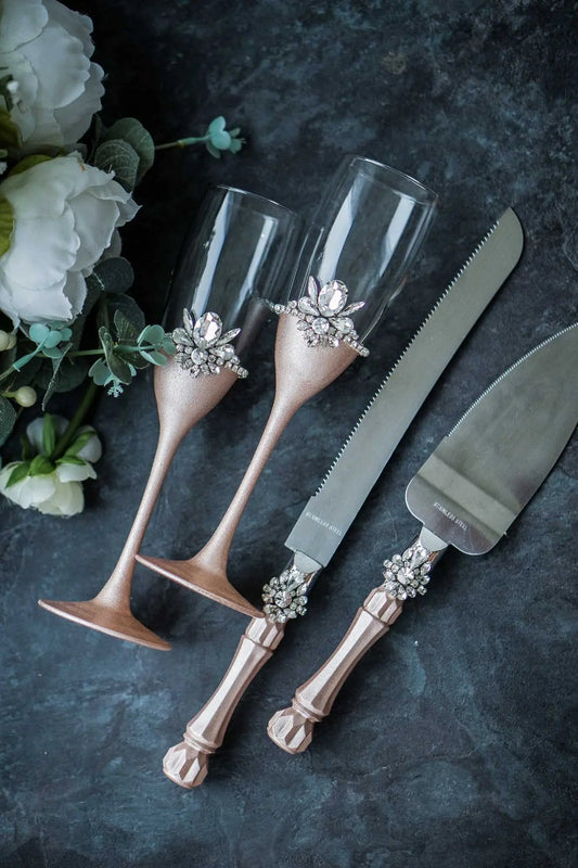 Rose gold wedding champagne flutes and cake server set