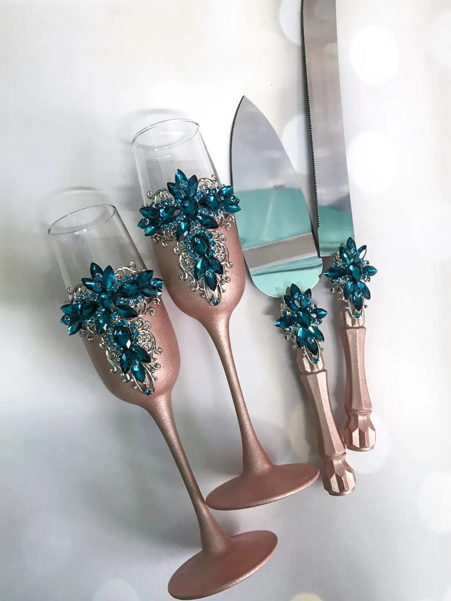 Exquisite Blue Teal and Rose Gold Crystals Luxury Flutes and Cake Cutting Set