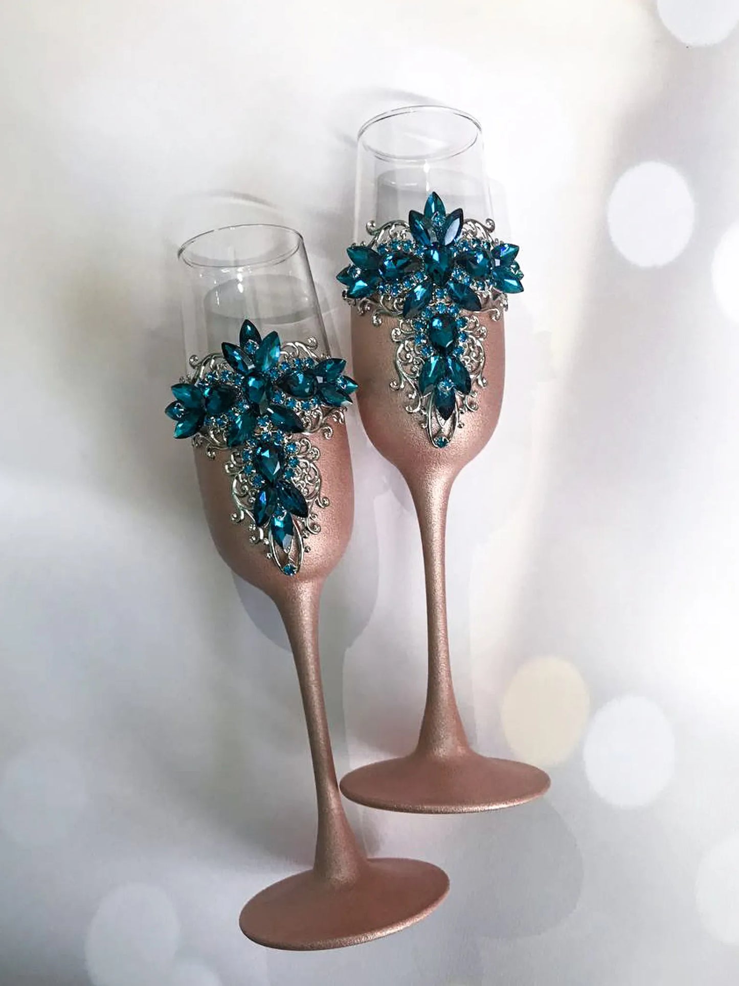Gloria Blue Teal and Rose Gold Wedding Flutes for the Bride and Groom