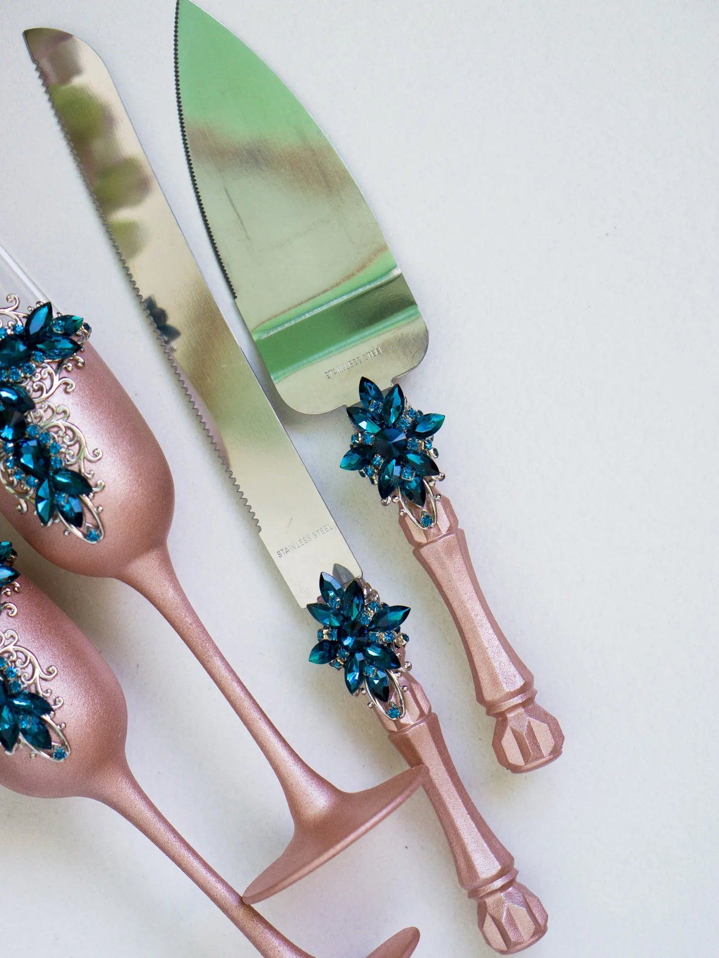 Exquisite Blue Teal and Rose Gold Crystals Luxury Flutes and Cake Cutting Set