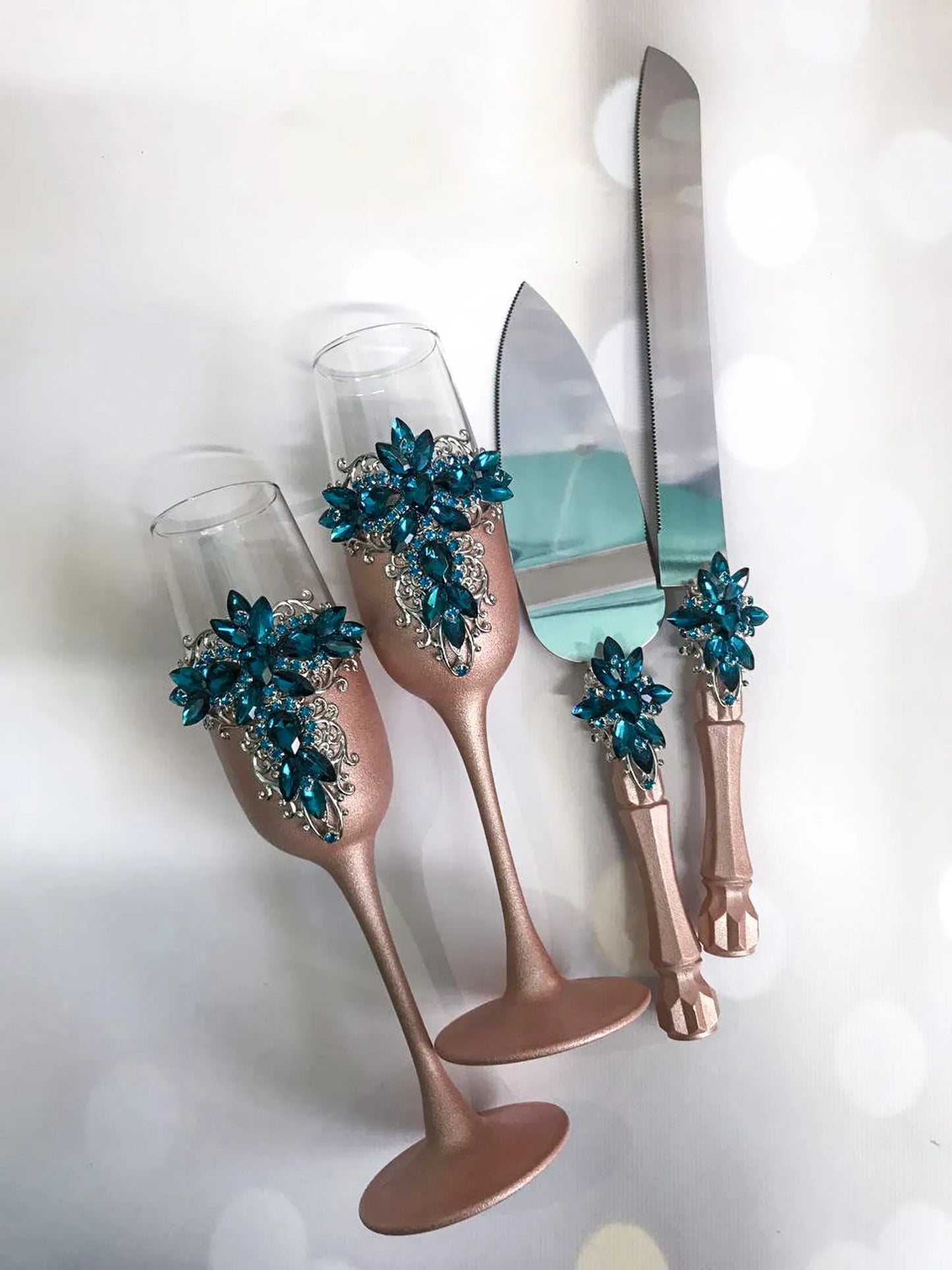 Exquisite Blue Teal and Rose Gold Crystals Luxury Flutes and Cake Cutting Set