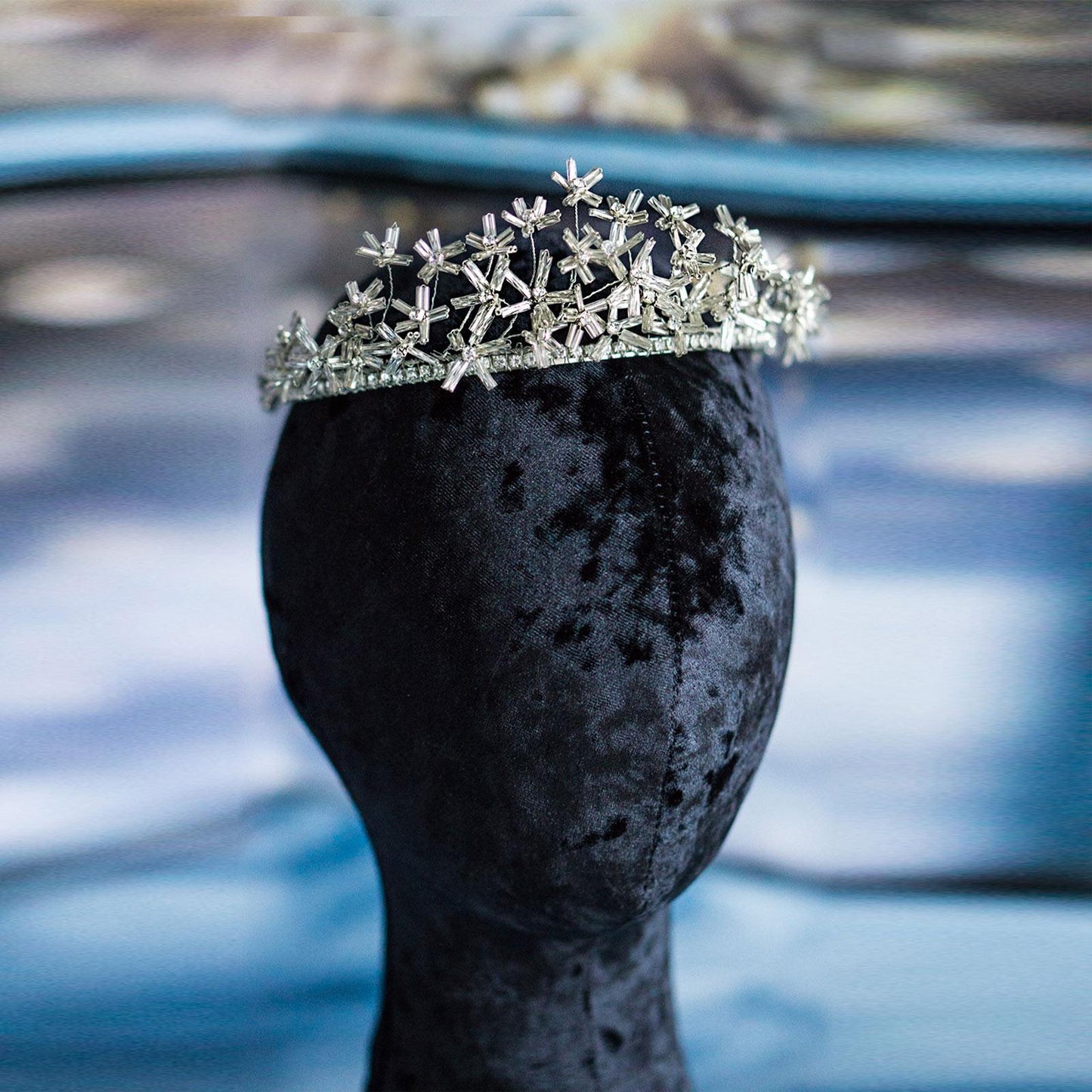Bridal tiara with silver crystal daisy flowers on model