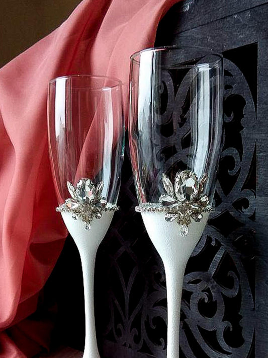 White and silver wedding flutes
