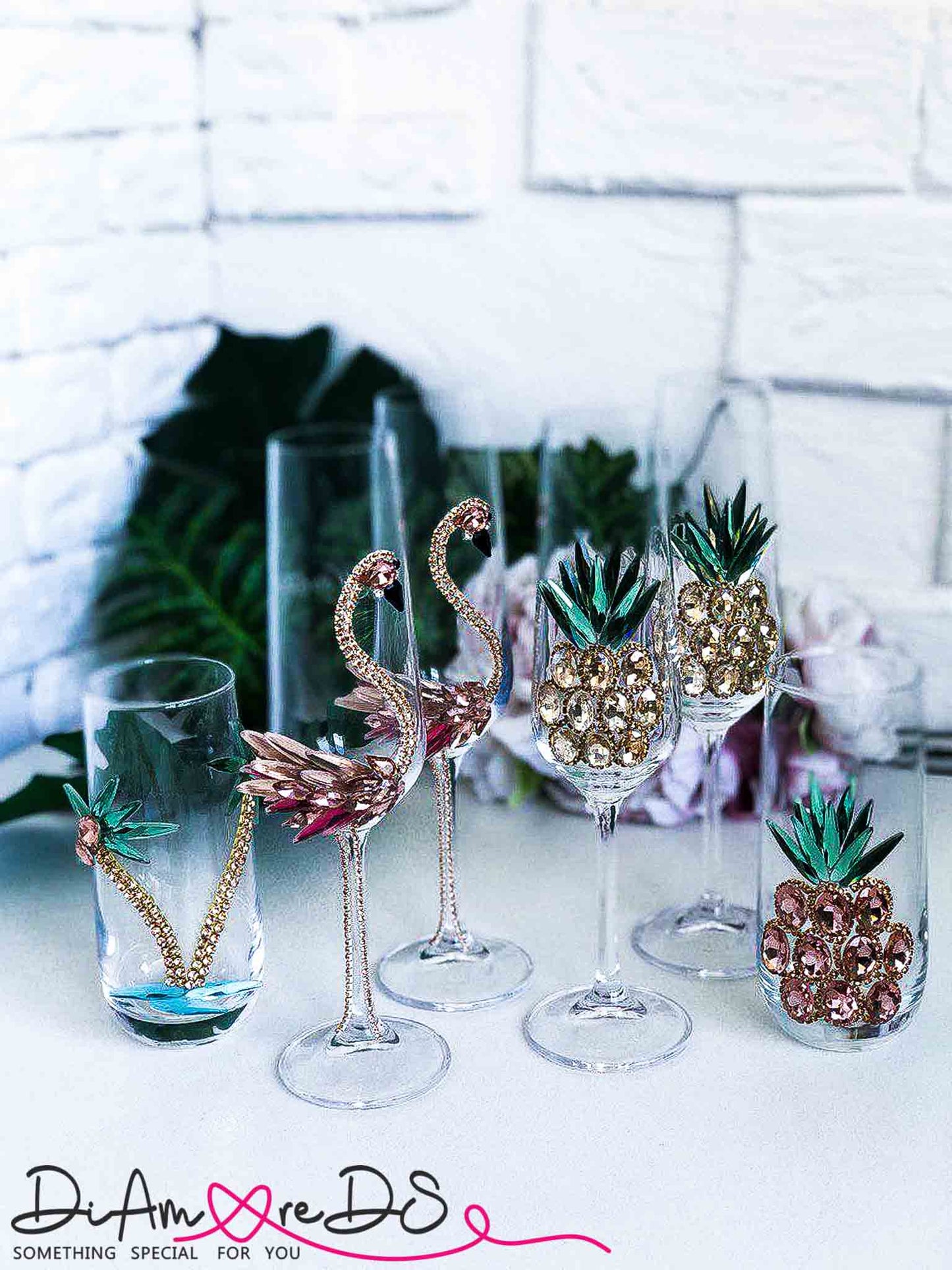 Custom-designed crystal glass set with sparkling flamingos and turtles, perfect for adding a touch of glamour to any celebration.
