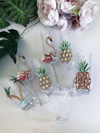 Opulent wine glass with rose gold pineapple crystals, adding a luxurious touch to any celebration.