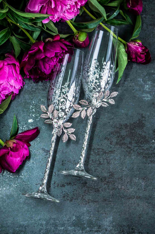 Elegant silver wedding champagne flutes with personalization option
