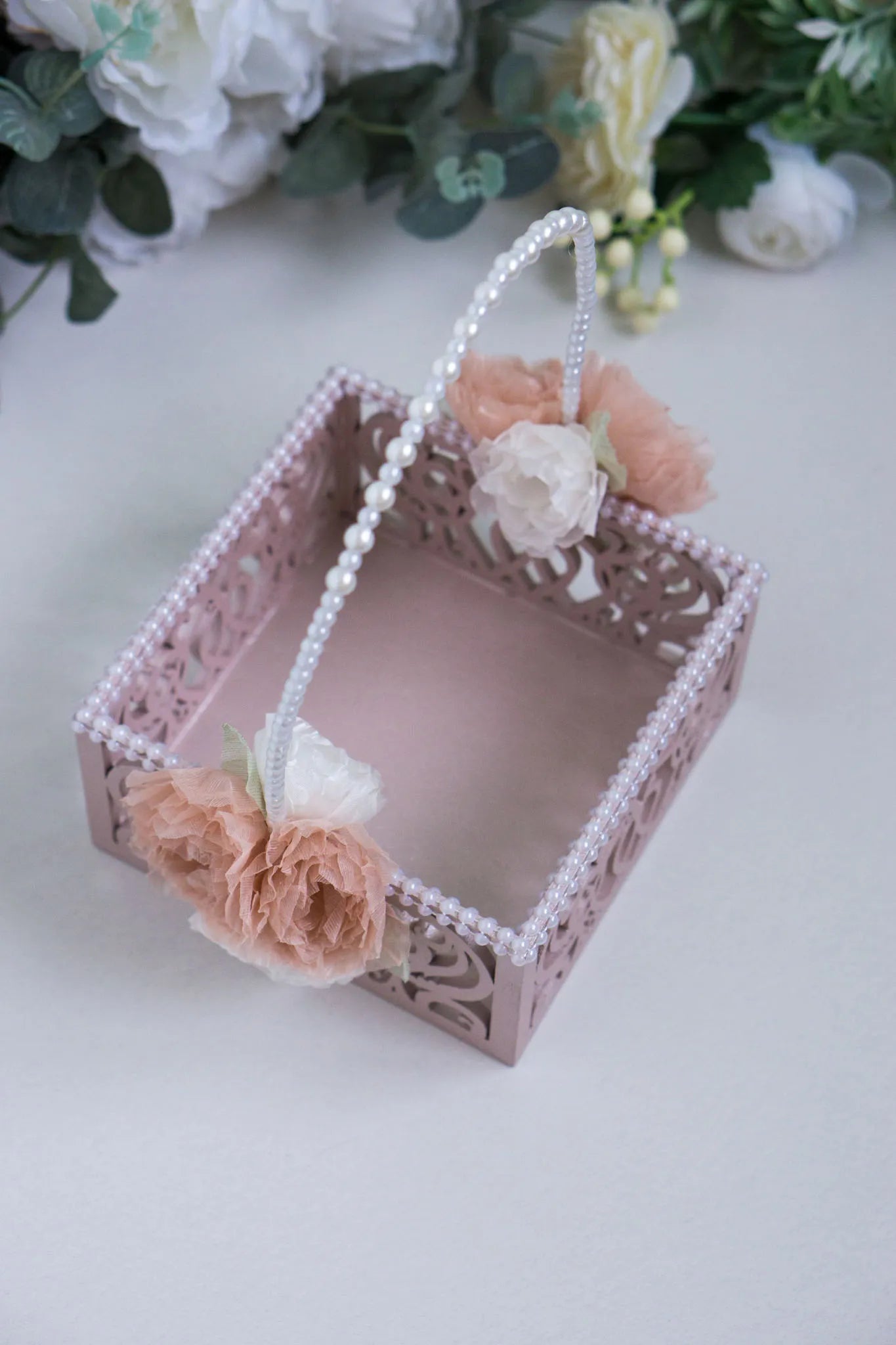 Vintage-inspired flower girl basket