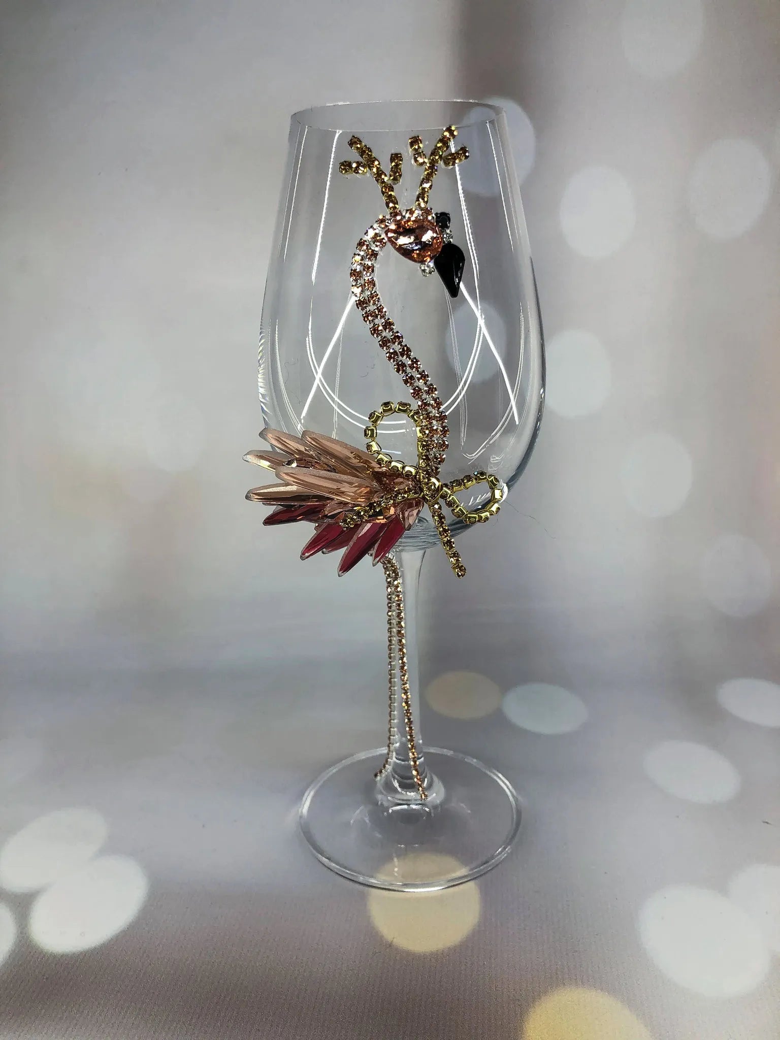 Handmade glass with golden flamingo