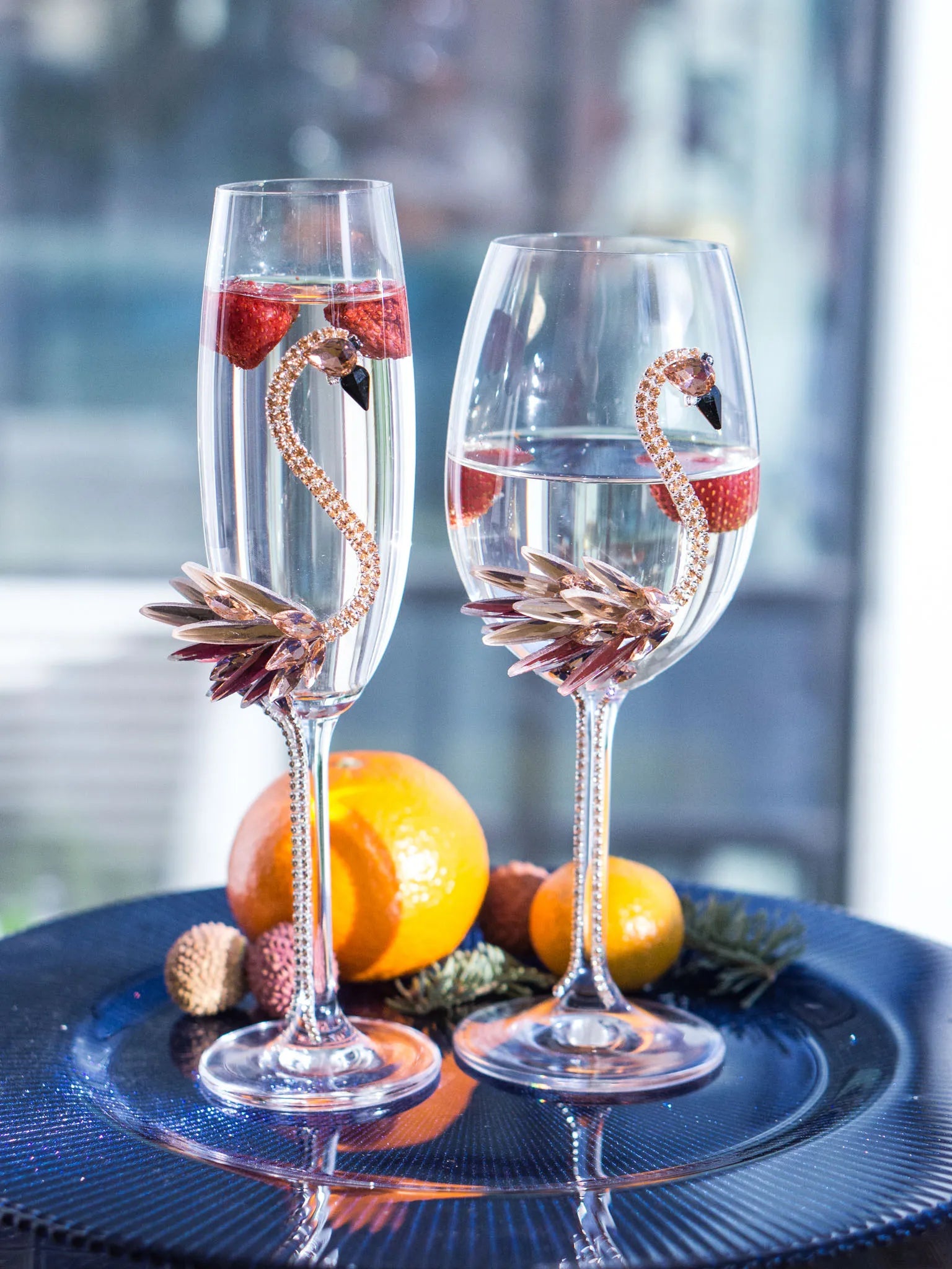 Elegant crystal pink flamingo champagne flutes and personalized wine glasses, ideal for adding a touch of uniqueness and personal flair to celebrations.