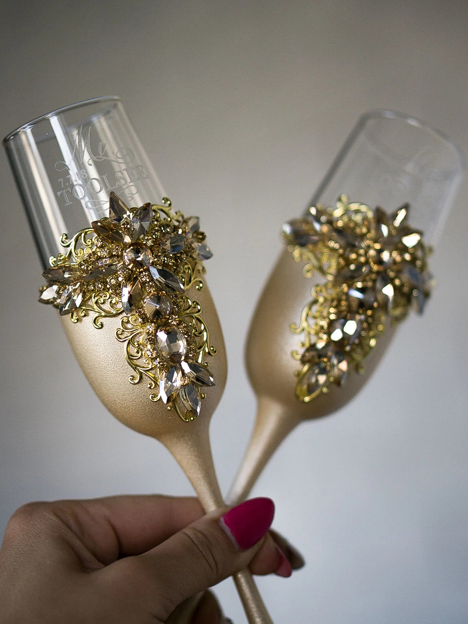 Crystal-adorned champagne flutes