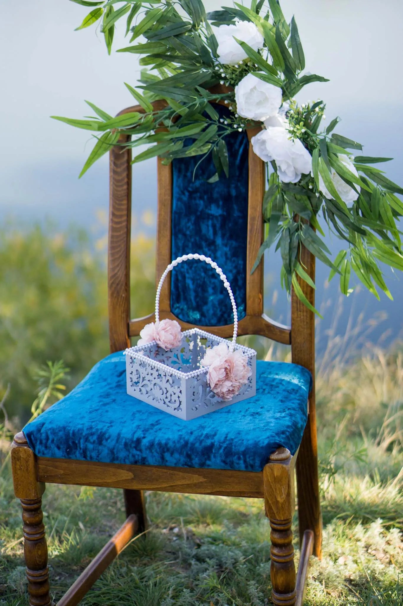 Charming flower girl basket crafted from eco-conscious wood with pearl decorations