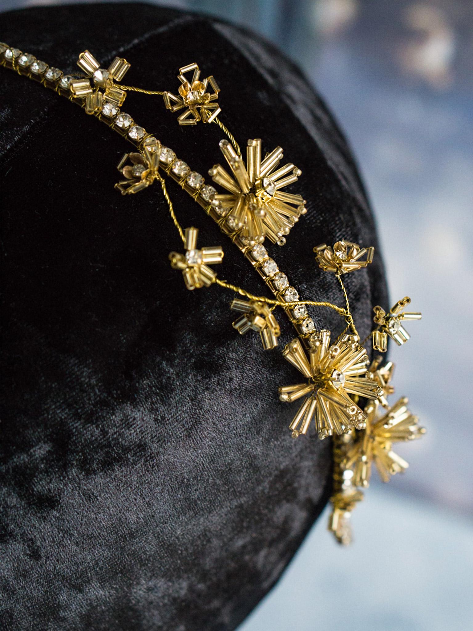 Gold headband with dandelion and wildflower design