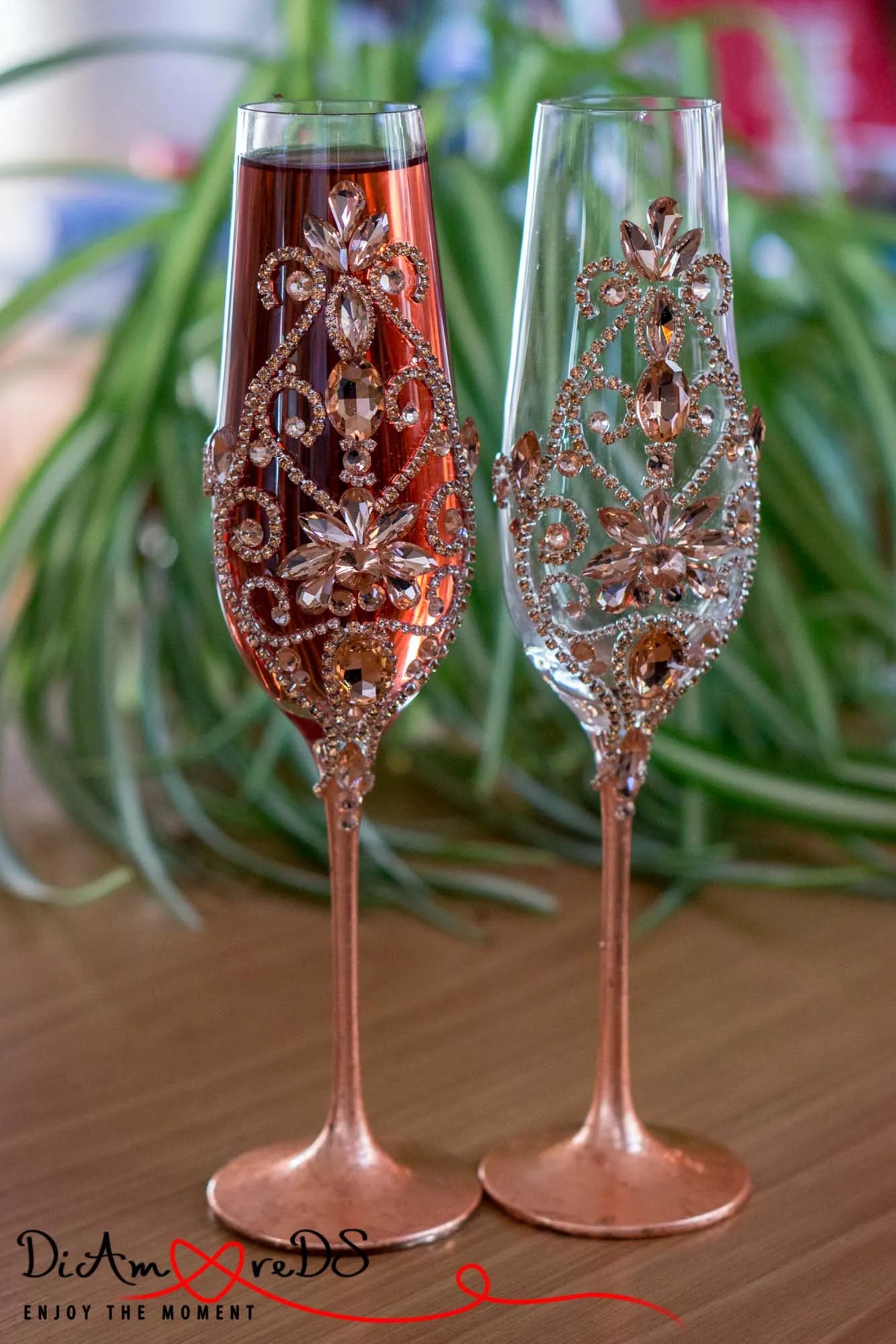 Rhinestone-adorned wedding champagne glasses