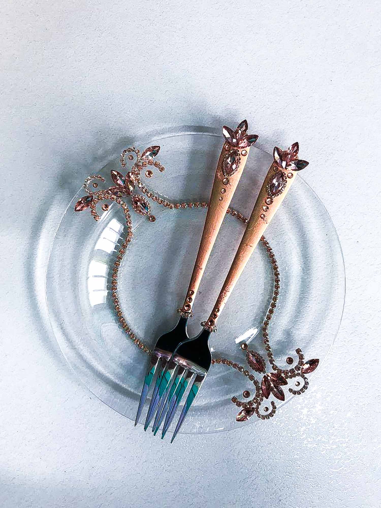 Rose gold wedding dessert plate with forks