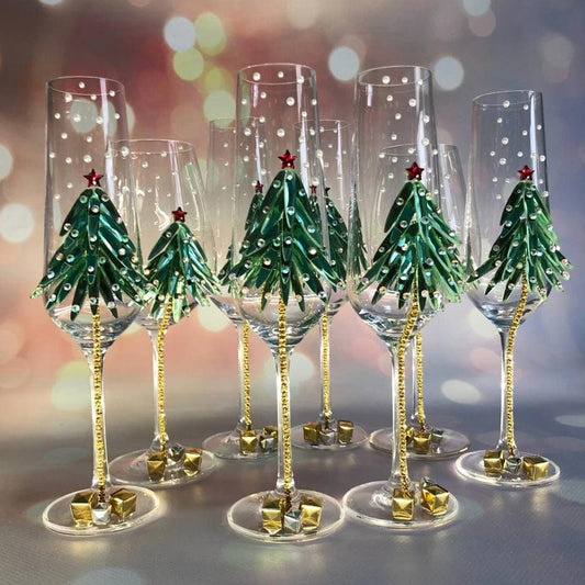 Personalized wine glasses adorned with a Christmas tree design from our Christmas Collection, perfect for festive celebrations.