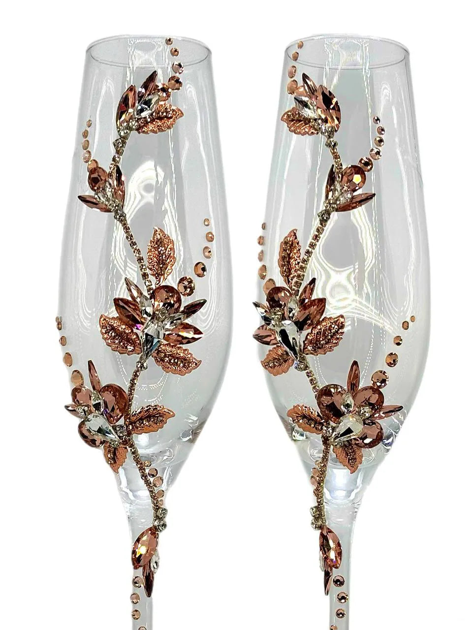 Beautiful wedding champagne glasses adorned with shimmering crystals