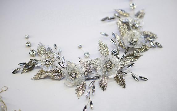 Stunning silver headband with crystal embellished flowers and leaves for the bride