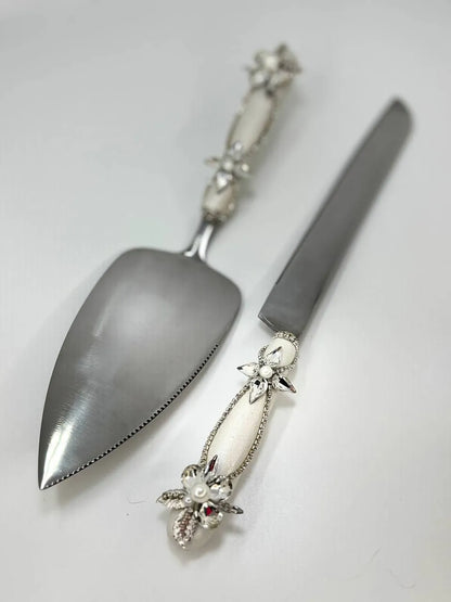 Cake knife and server set with metallic leaves and crystal embellishments