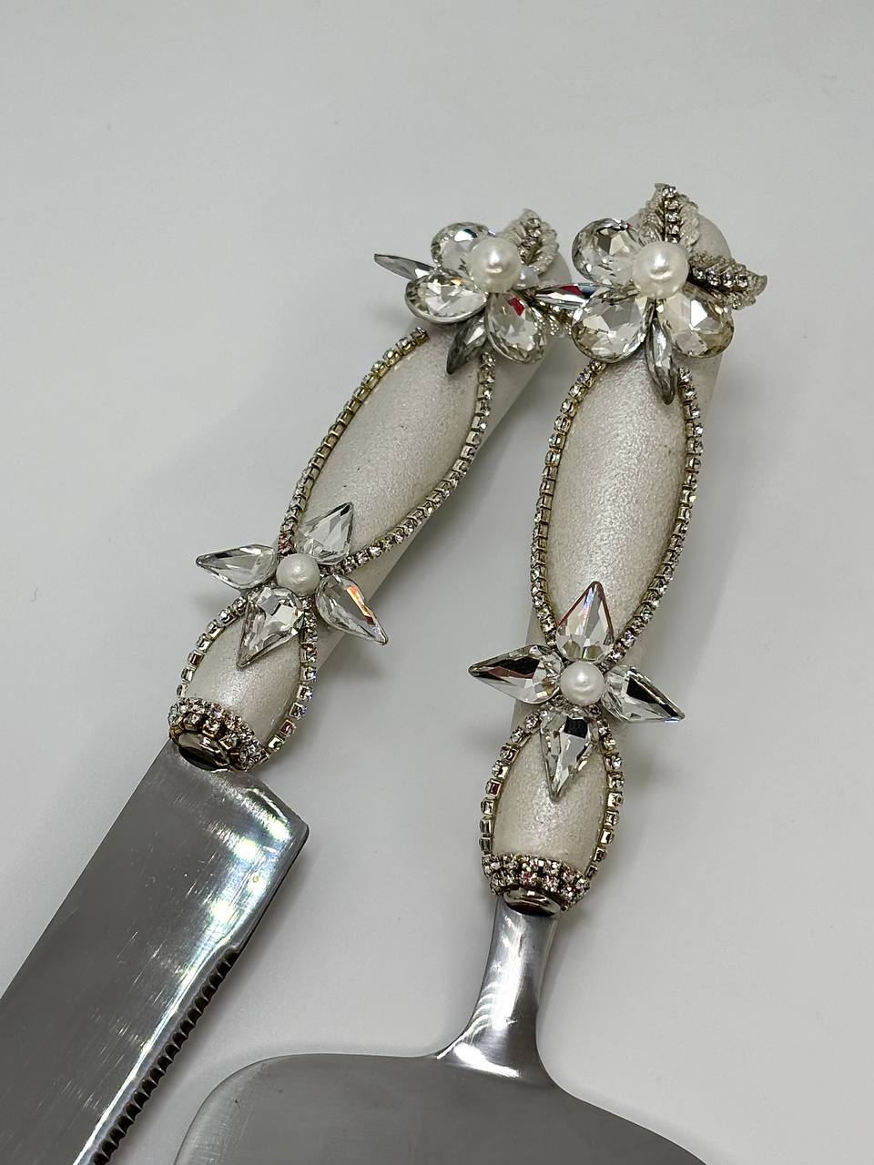 Elegant wedding cake knife and server set from the Silver Flowers collection