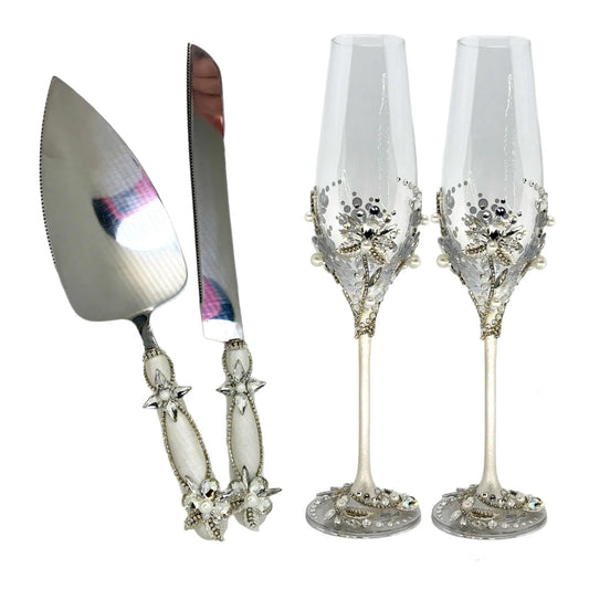 Beautifully crafted cake cutter and  server set champagne glasses with shimmering crystals and metallic leaves