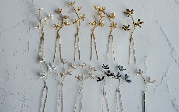 Delicate white flower hair pins for the bride or bridesmaids