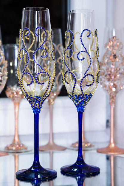 Two handcrafted champagne glasses symbolizing love and unity.