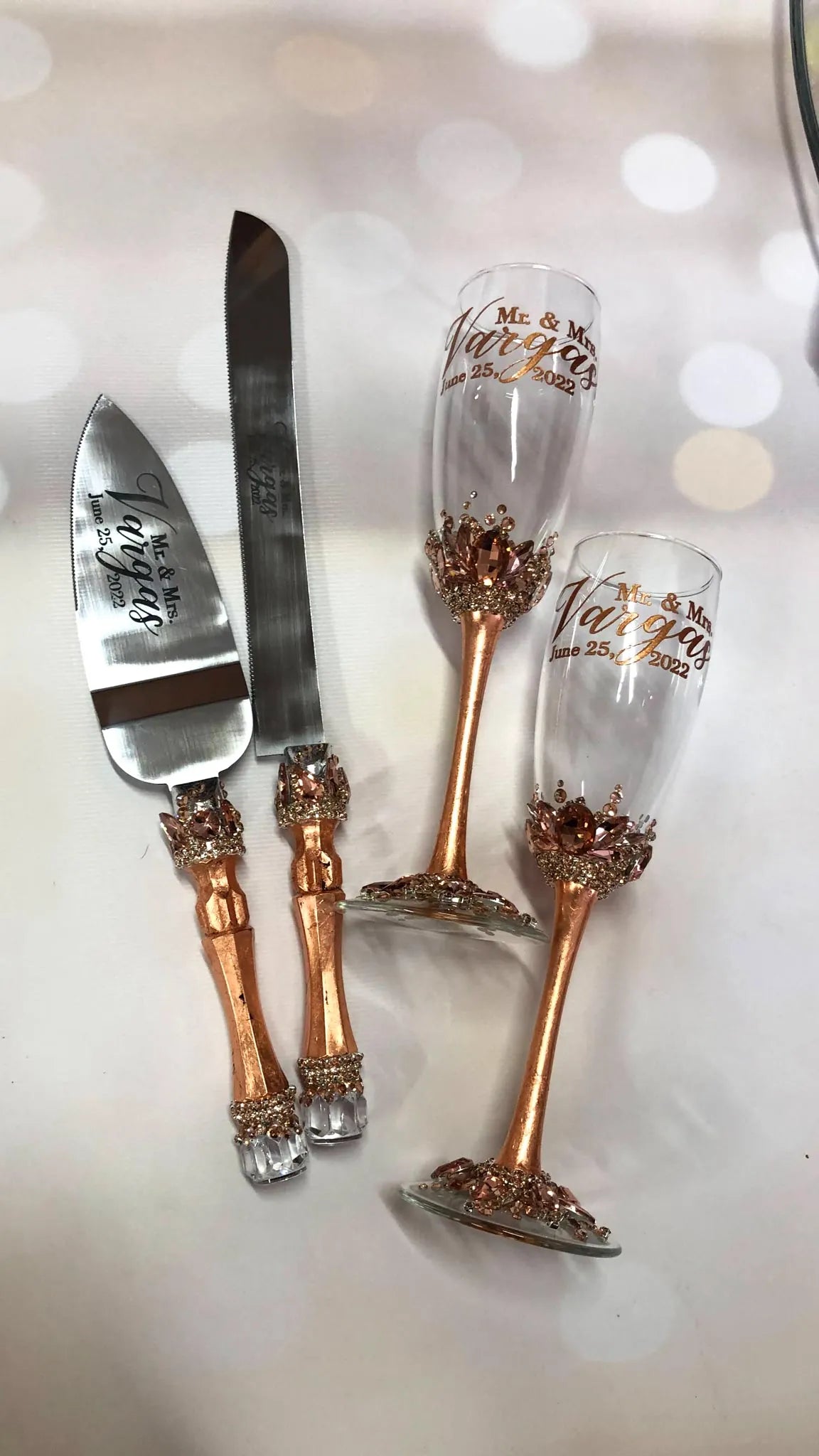 Victoria Rose Gold bride and groom toasting flutes