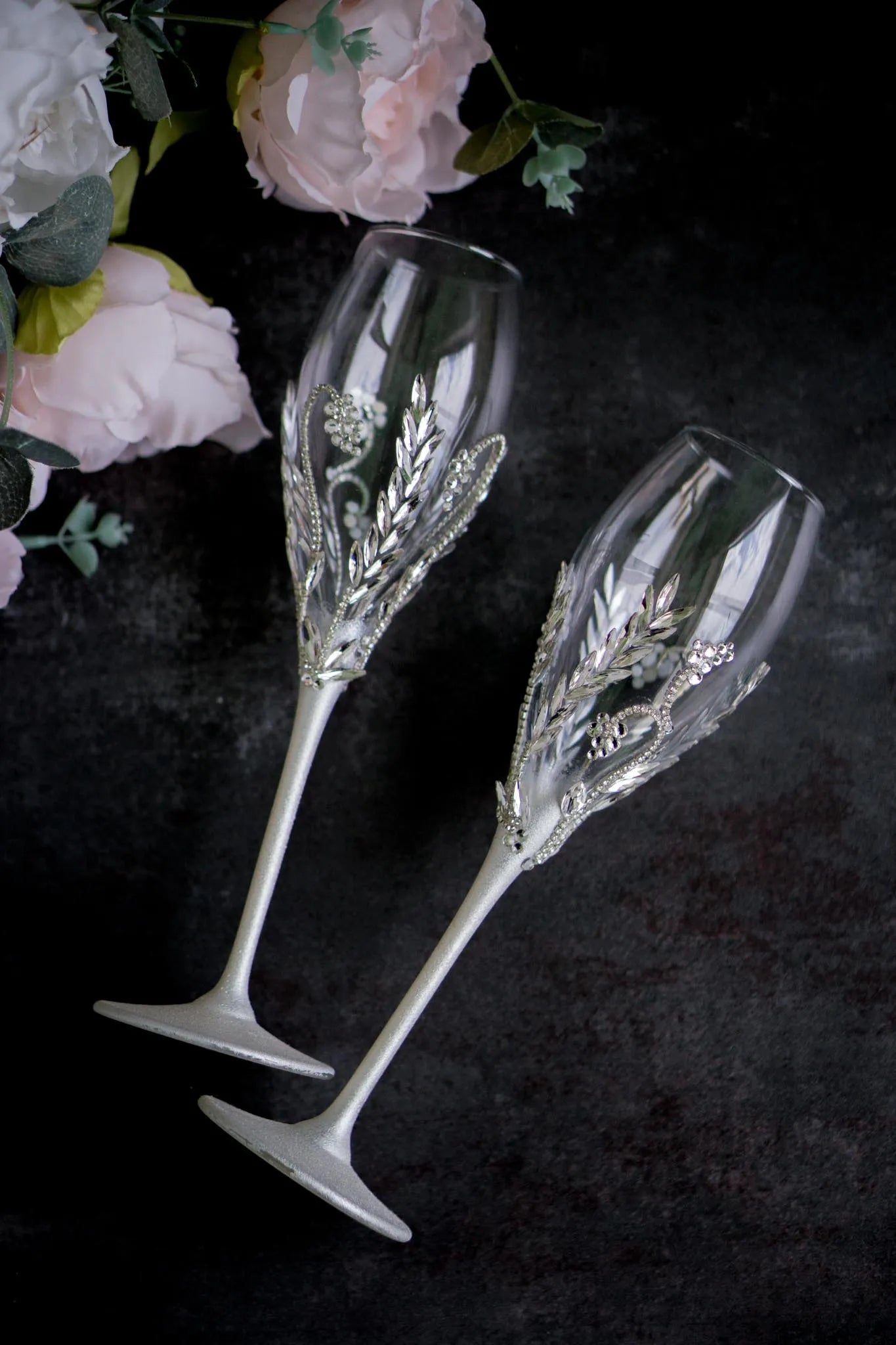 Rhinestone-adorned toasting flutes for special occasions