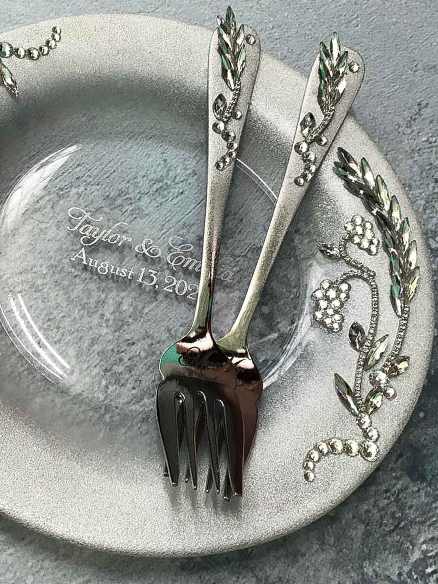 Rhinestone-adorned wedding plate and forks