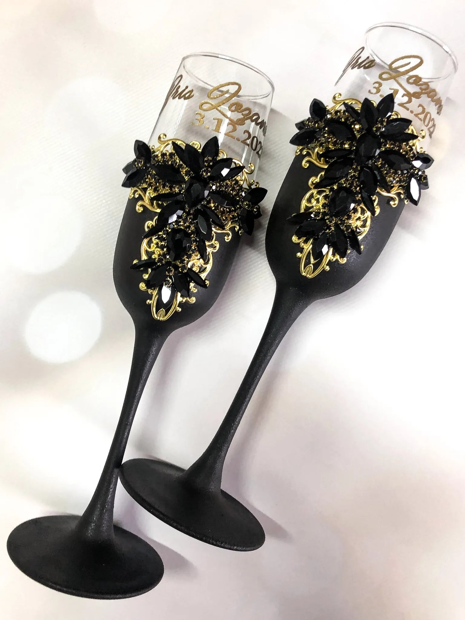 Gothic black and gold engraved champagne flutes