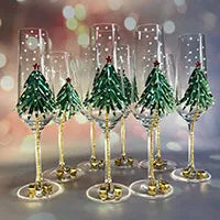 Festive holiday-themed glassware including Christmas cocktail glasses, Christmas glassware sets, wine glasses with holiday designs, Xmas cocktail glasses, and glasses perfect for Christmas celebrations, designed to add a touch of seasonal cheer to any holiday table setting