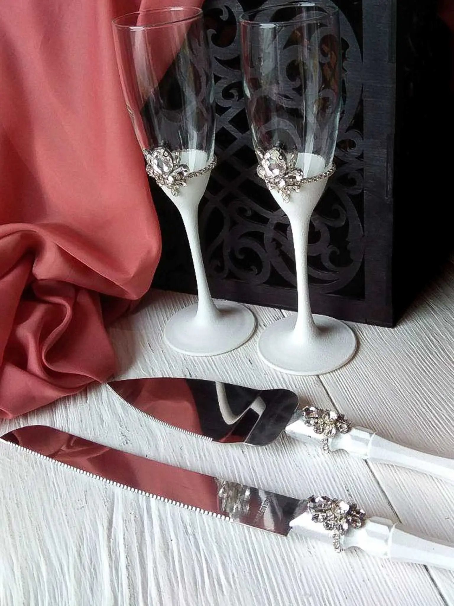 Handcrafted wedding flutes and cake serving utensils