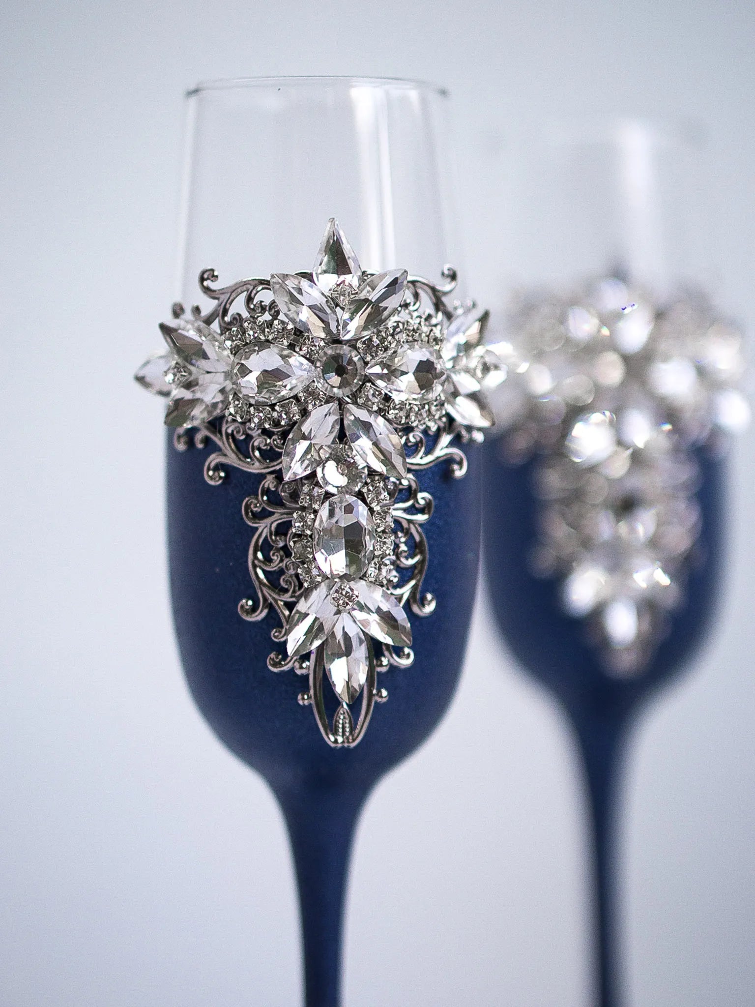 Silver and Navy Blue Wedding Champagne Flutes and Cake Knife Set with Crystals