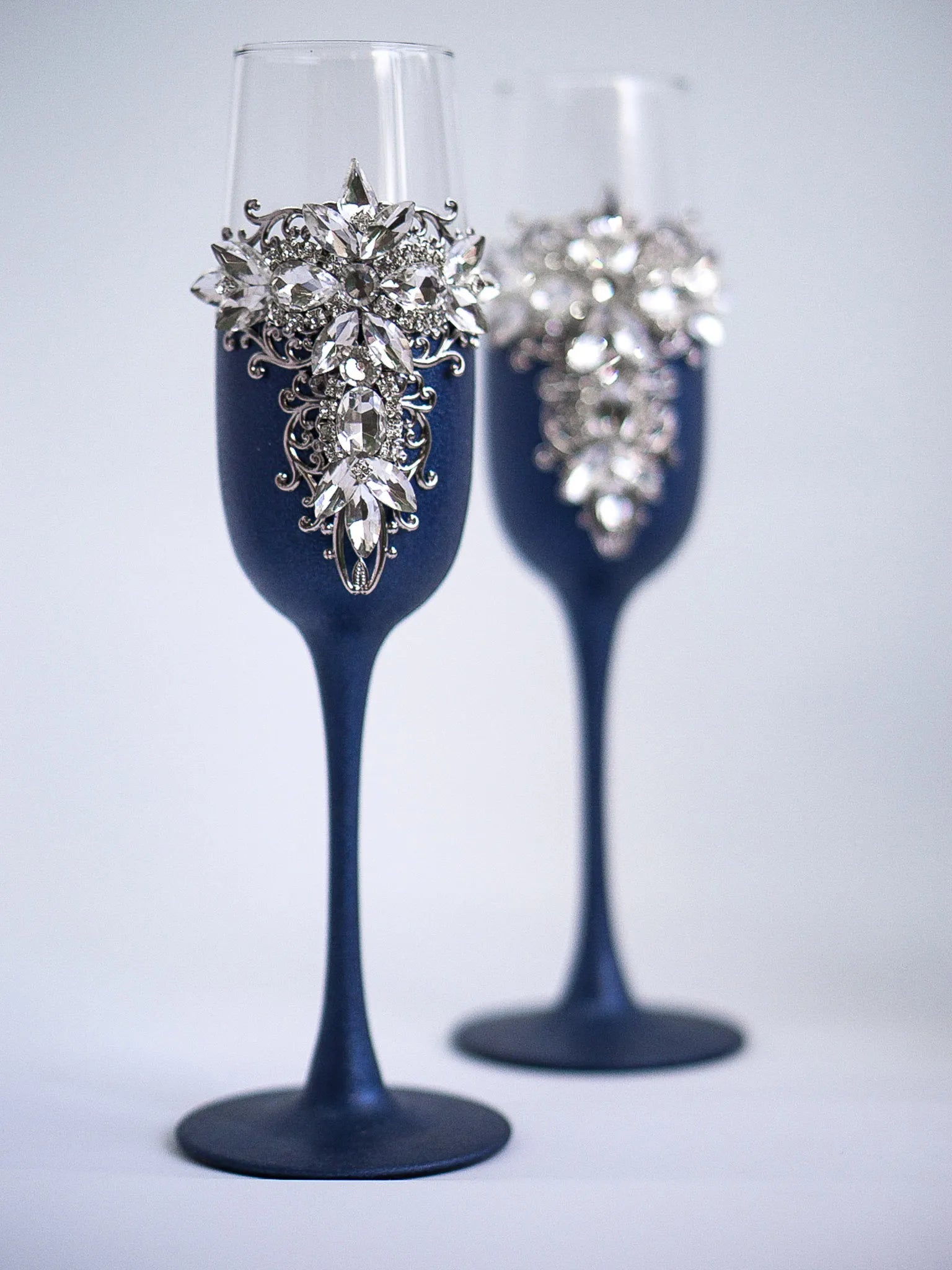 Engraved navy blue wedding toasting glasses