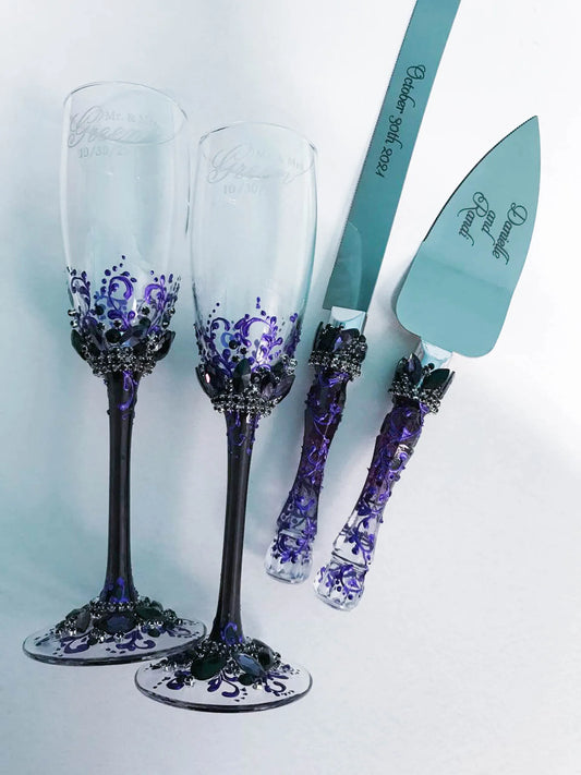 Elegant purple wedding champagne flutes and cake cutting set