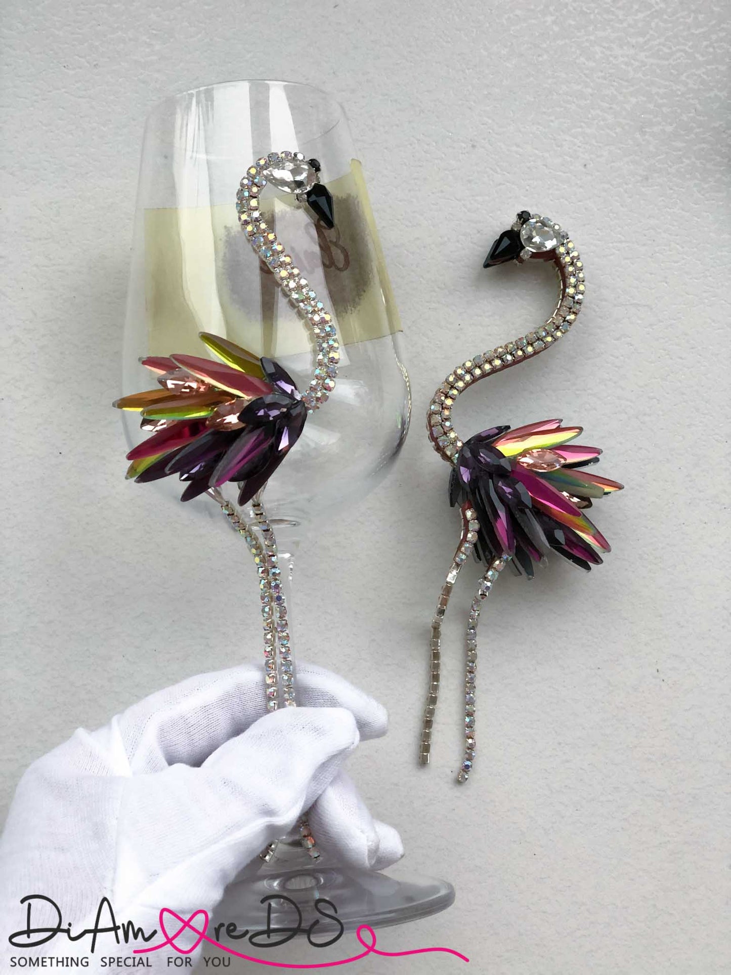 Whimsical champagne flutes with flamingos