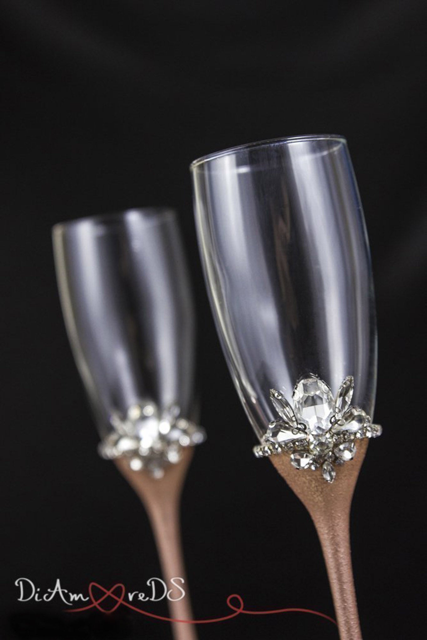 Handcrafted wedding flutes in rose gold and silver