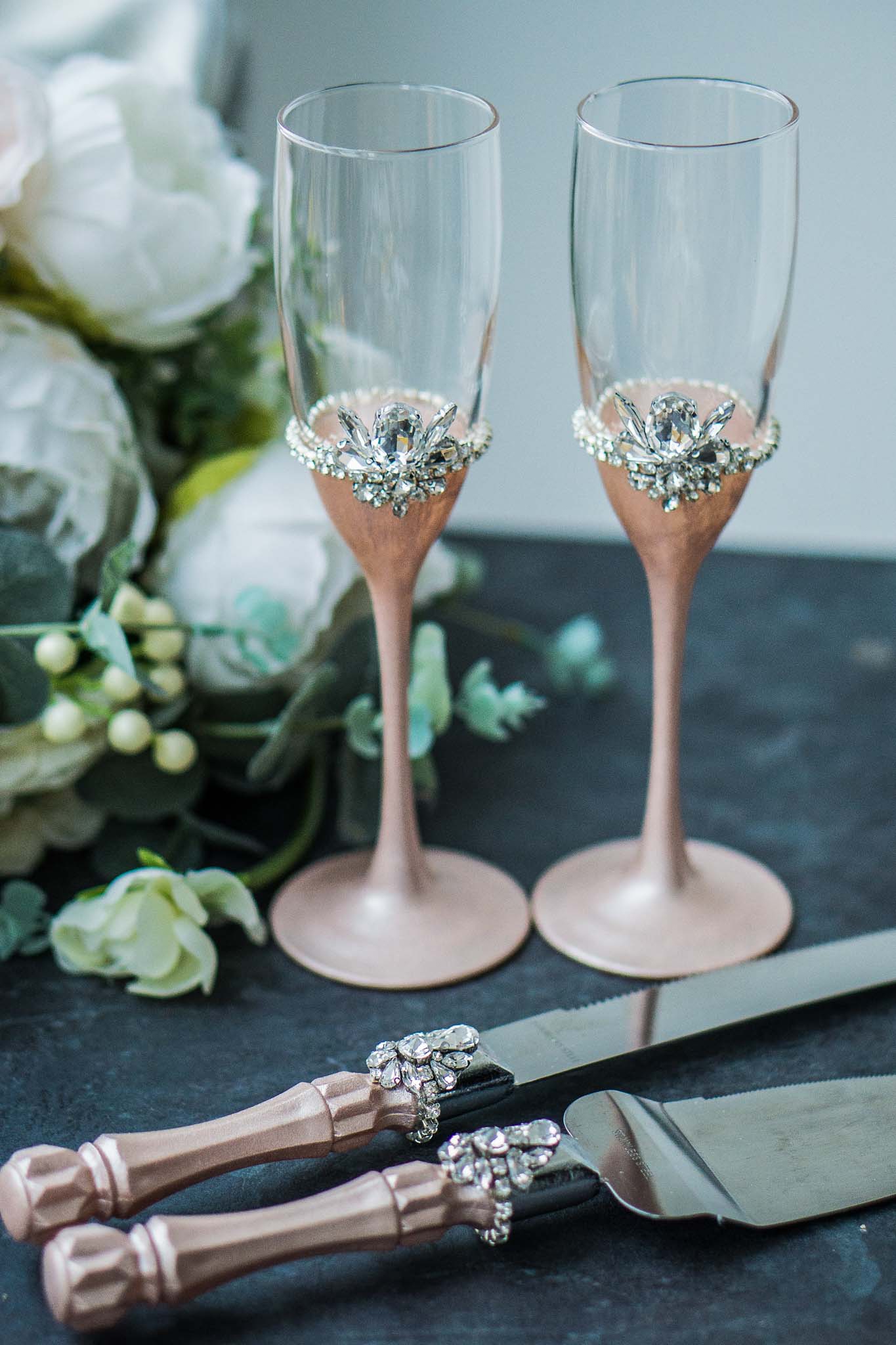 Luxurious rose gold wedding essentials adorned with crystals