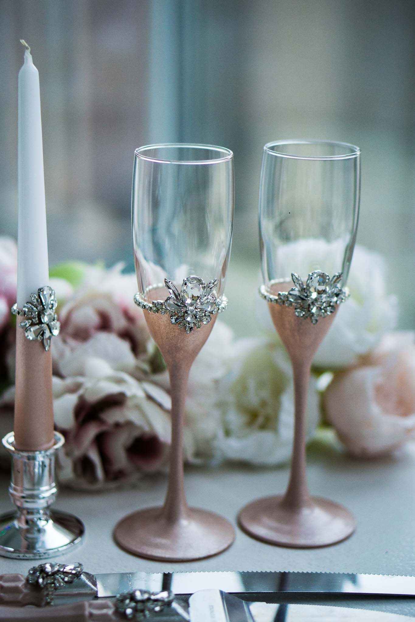 Artisan-crafted wedding flutes and candles