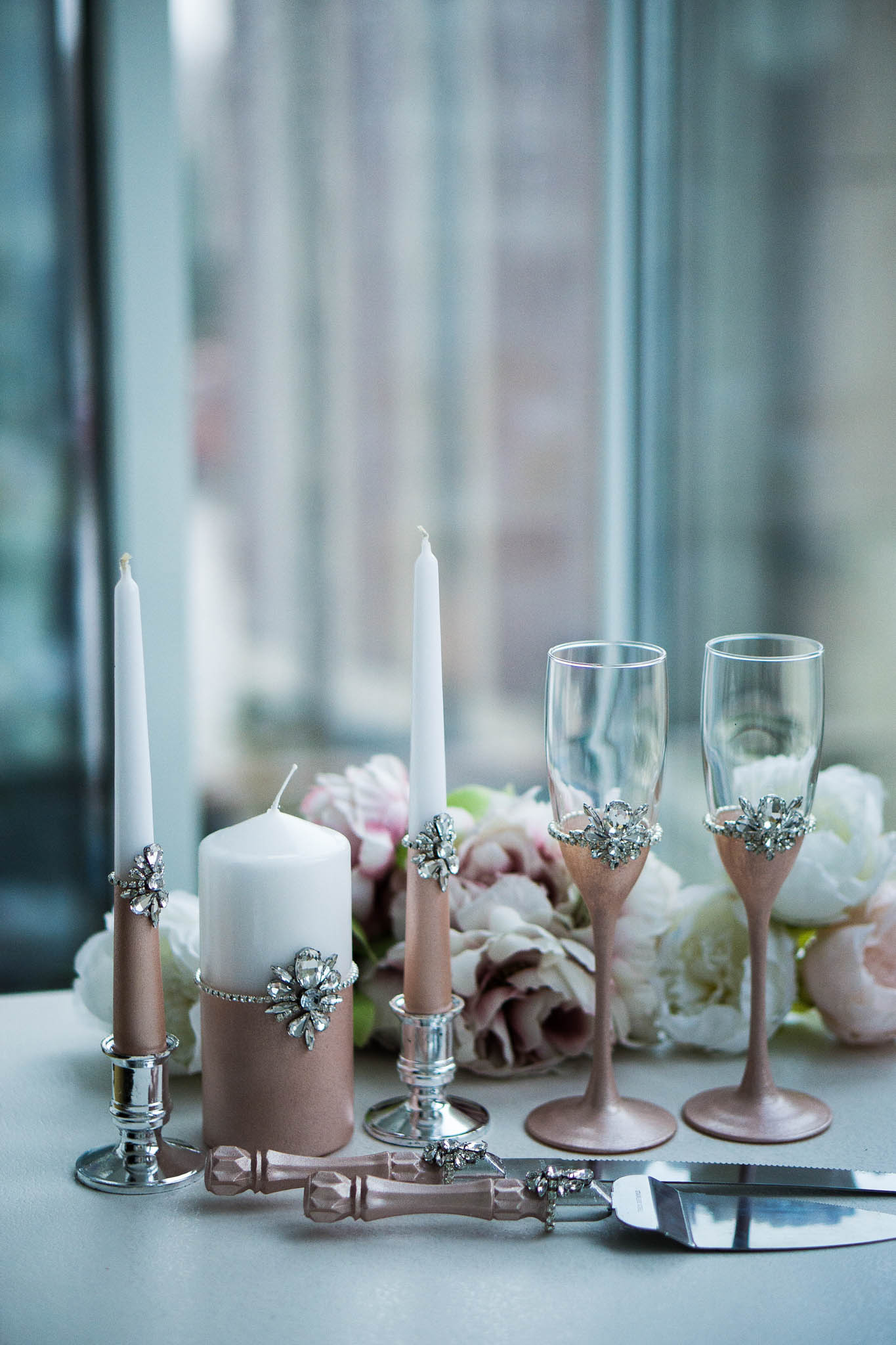 Rose gold unity candles, crafted for a bespoke wedding experience.