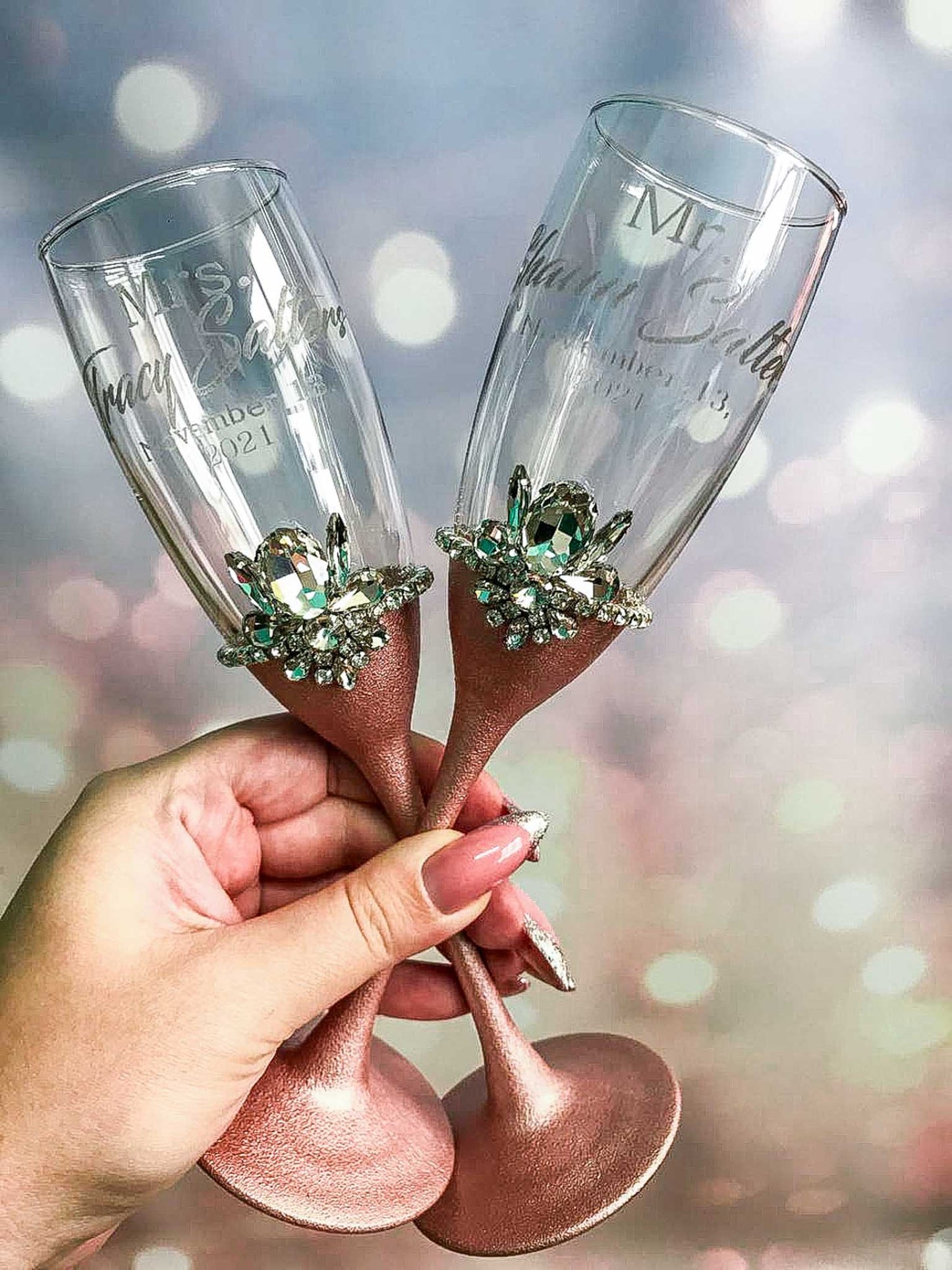 Stunning rose gold and silver wedding toast glasses