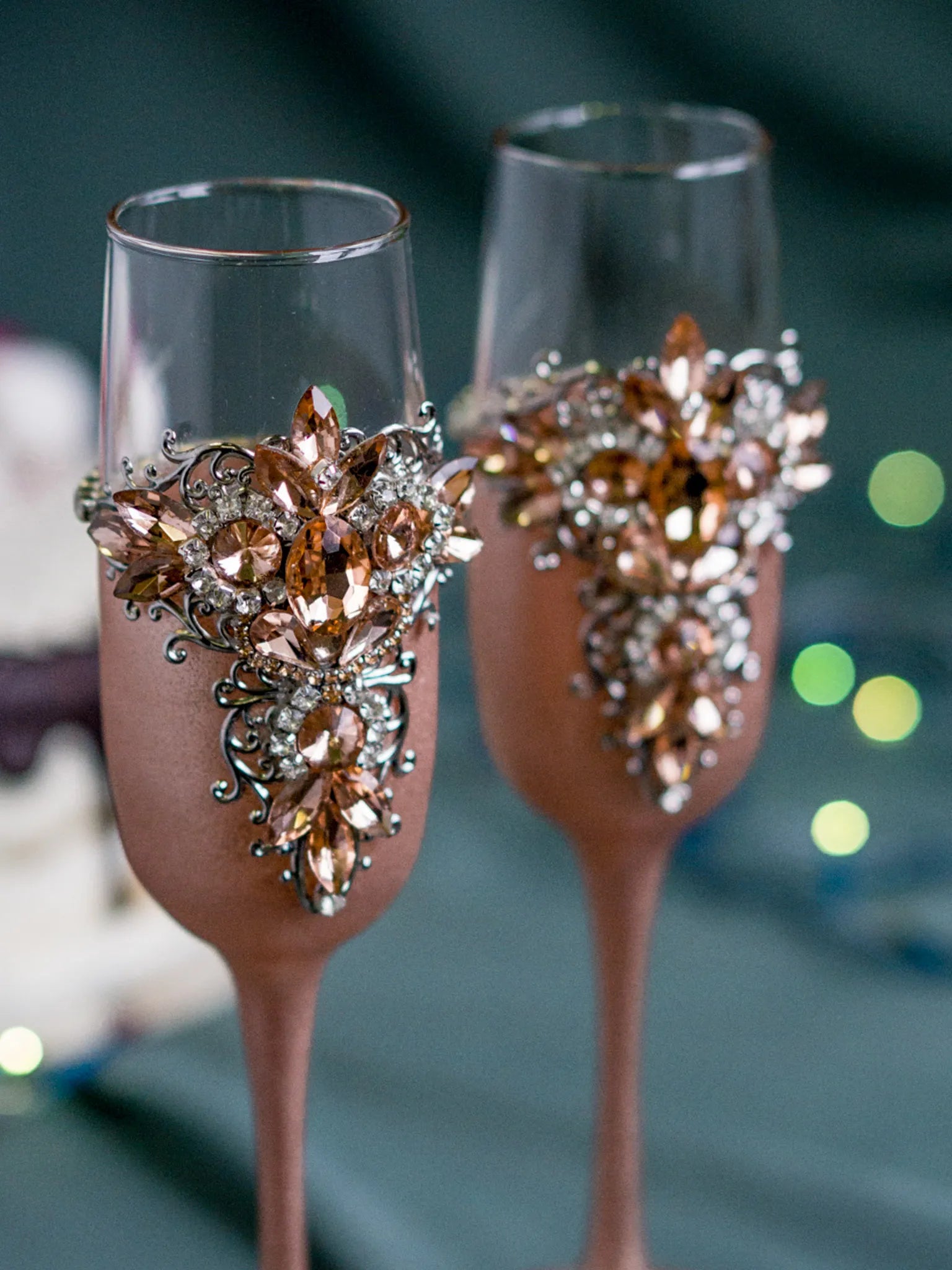 Customizable champagne glasses in metallic rose gold