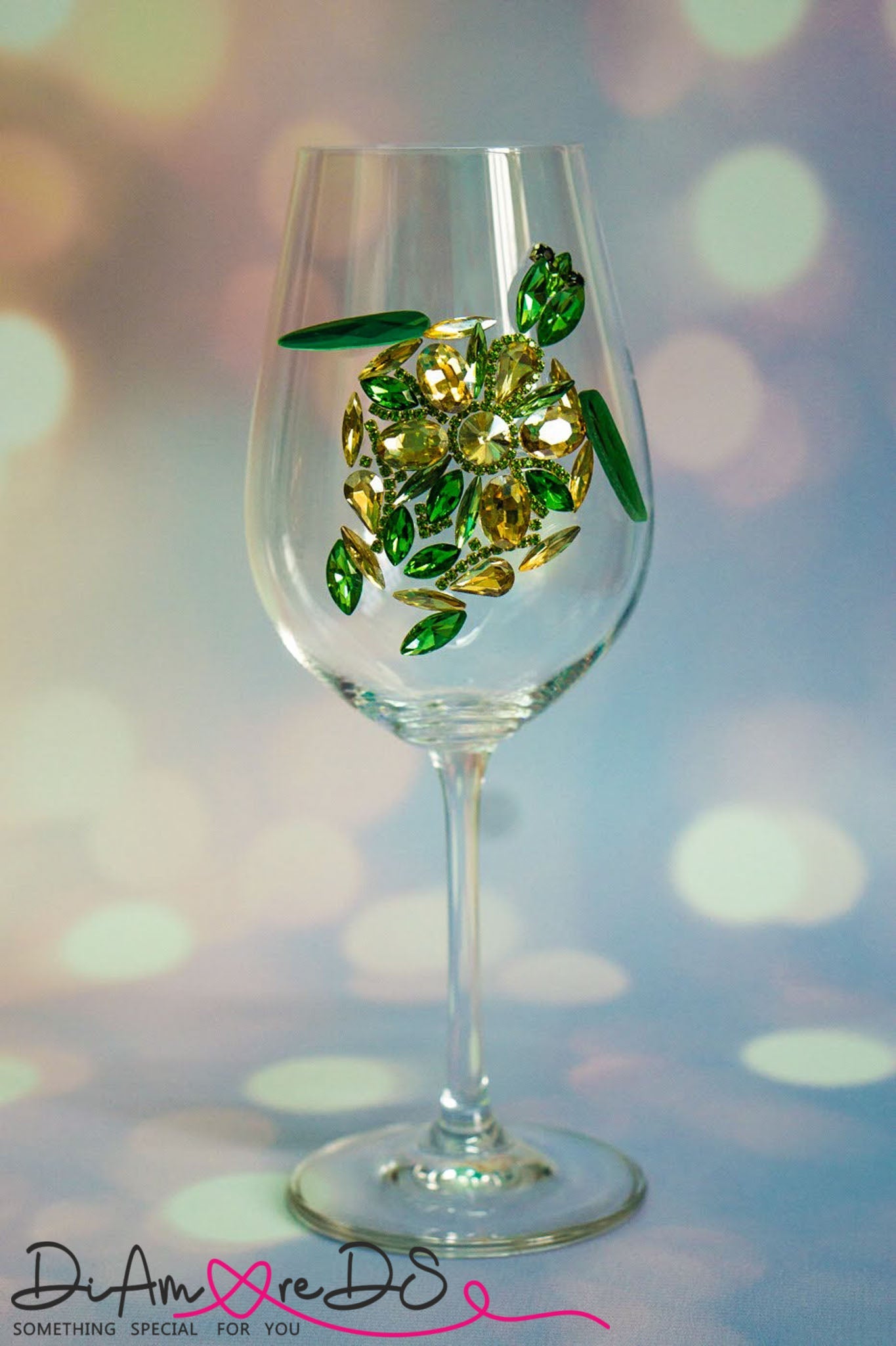 Exquisite sea turtle champagne glass with emerald and gold crystals, bringing marine elegance to any table setting.