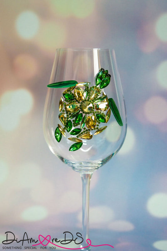 Handcrafted champagne flute featuring an intricate green sea turtle made from shimmering jewels, perfect for tropical-themed decor.