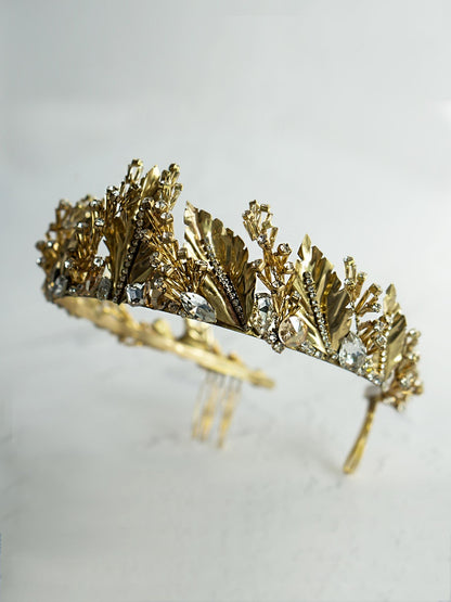 Side view of Gold Wedding Crown with Leaves and Crystals on white background