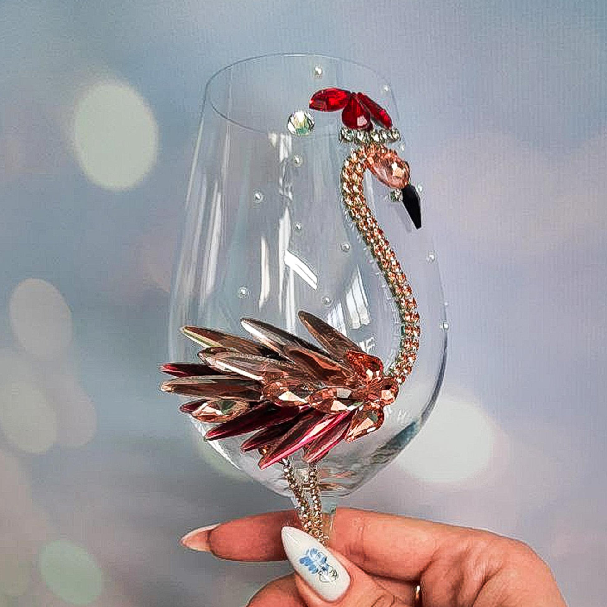 https://diamoreds.shop/cdn/shop/products/Christmas-Flamingo-Wine-Glasses-with-Gifts-in-Santa-Hat-1.jpg?v=1638479335&width=1946